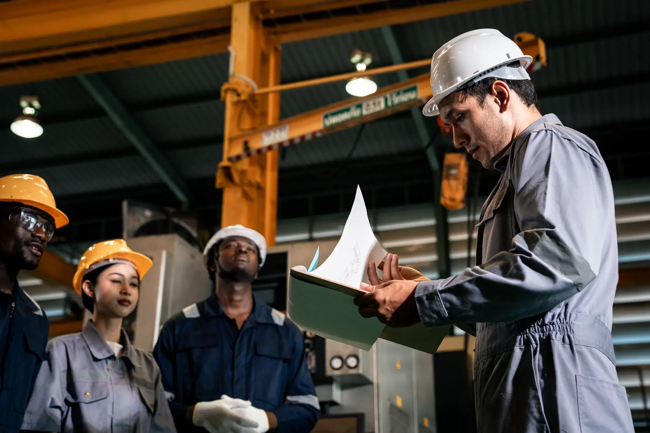 Industrial worker reviewing auction compliance documentation