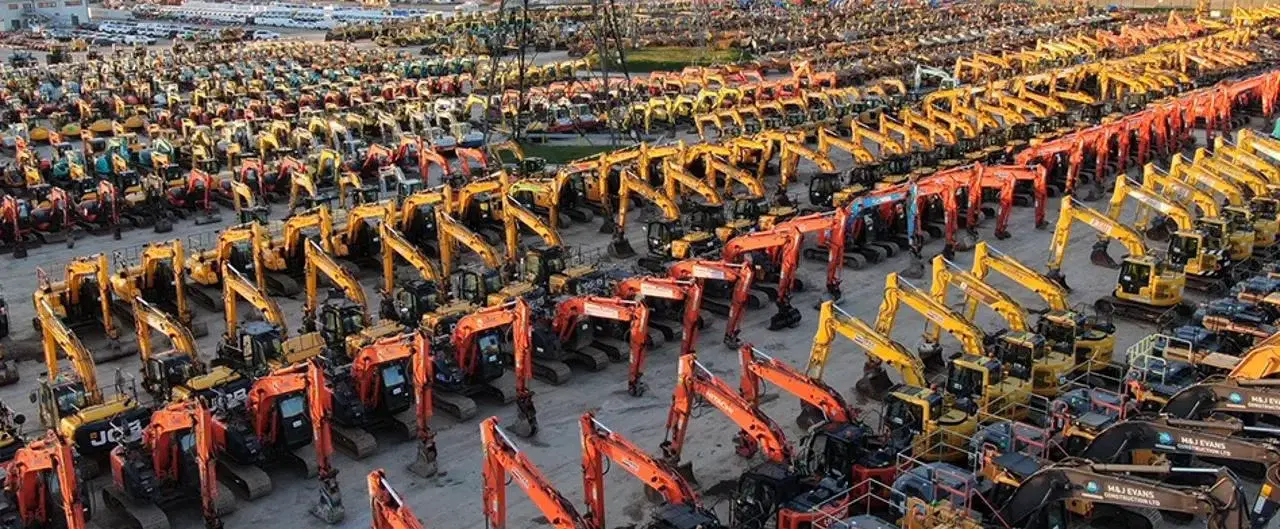 Aerial view of a large equipment auction yard
